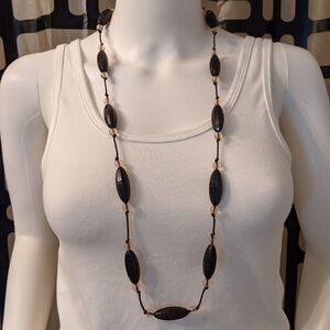 Black & clear faceted bead necklace on cording